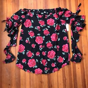 Off shoulder ruffle sleeve dress.